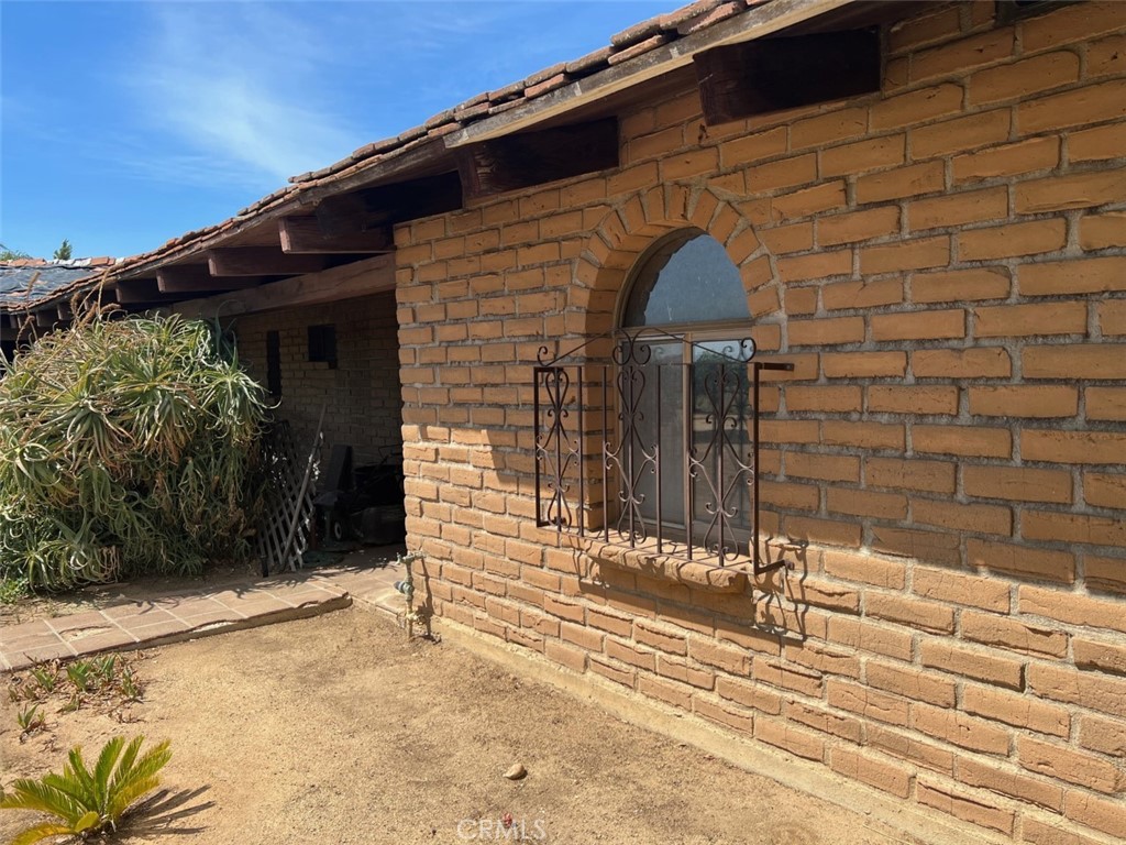 41220 Calle Contento Temecula, CA 92592 - Photo 12 of 30 a front view of a house with a yard