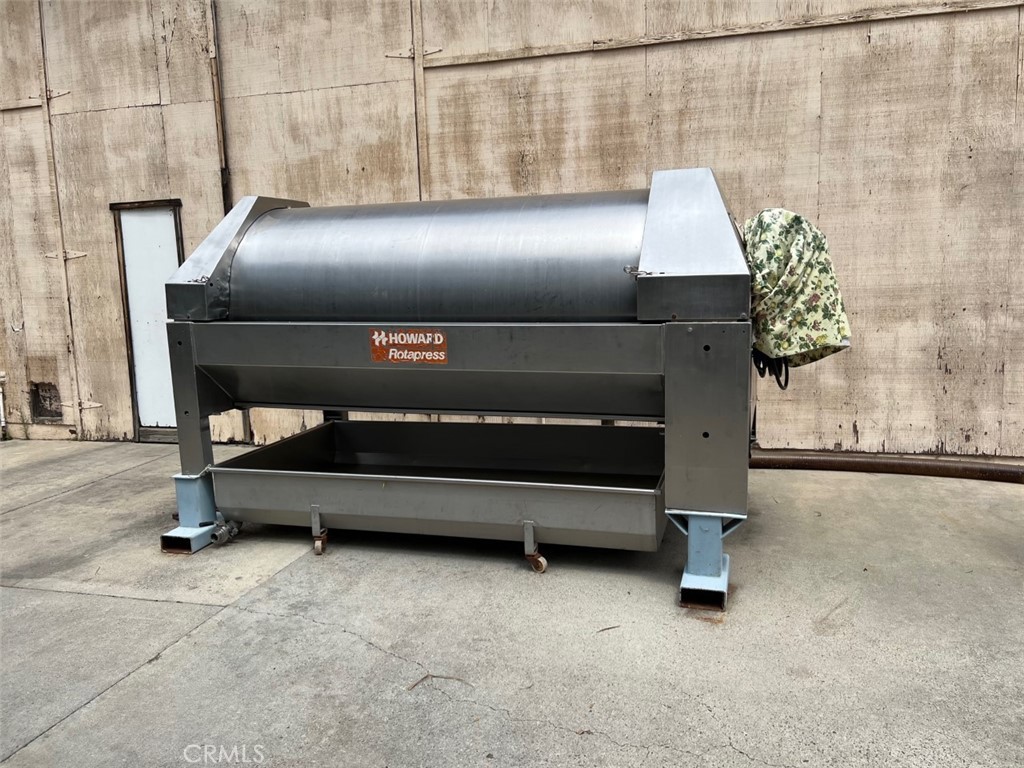 41220 Calle Contento Temecula, CA 92592 - Photo 20 of 30 a bedroom with a bed and lamp with the wall