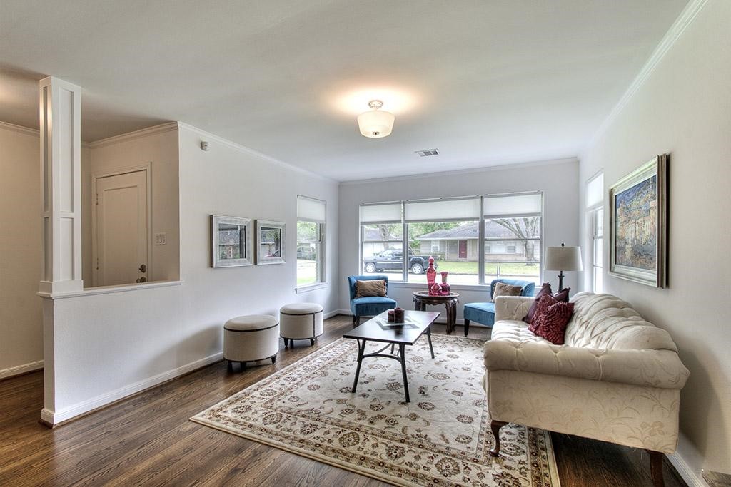 3110 Deal Street Houston, TX 77025 - Photo 2 of 10 a living room with furniture and a large window