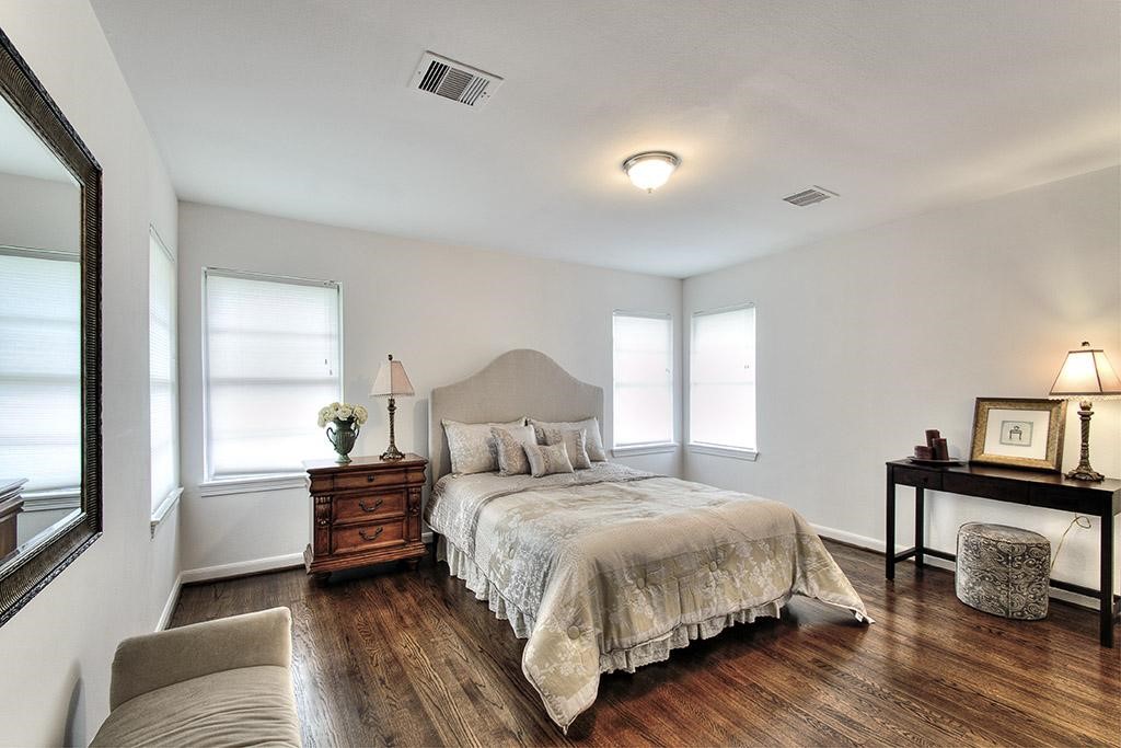 3110 Deal Street Houston, TX 77025 - Photo 7 of 10 a bedroom with a bed and a window