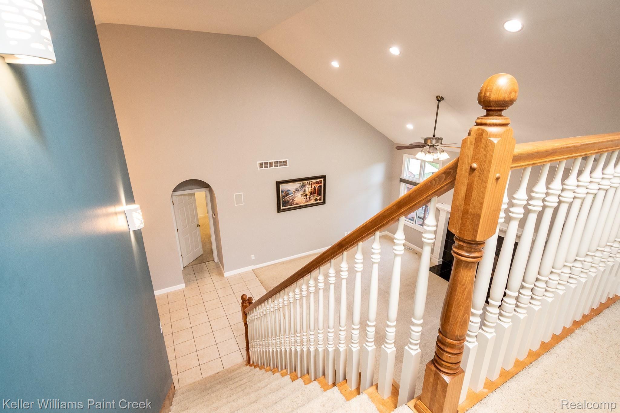 3307 Hazelton Avenue Rochester, MI 48307 - Photo 25 of 41 Stairs to upper level with detailed spindles