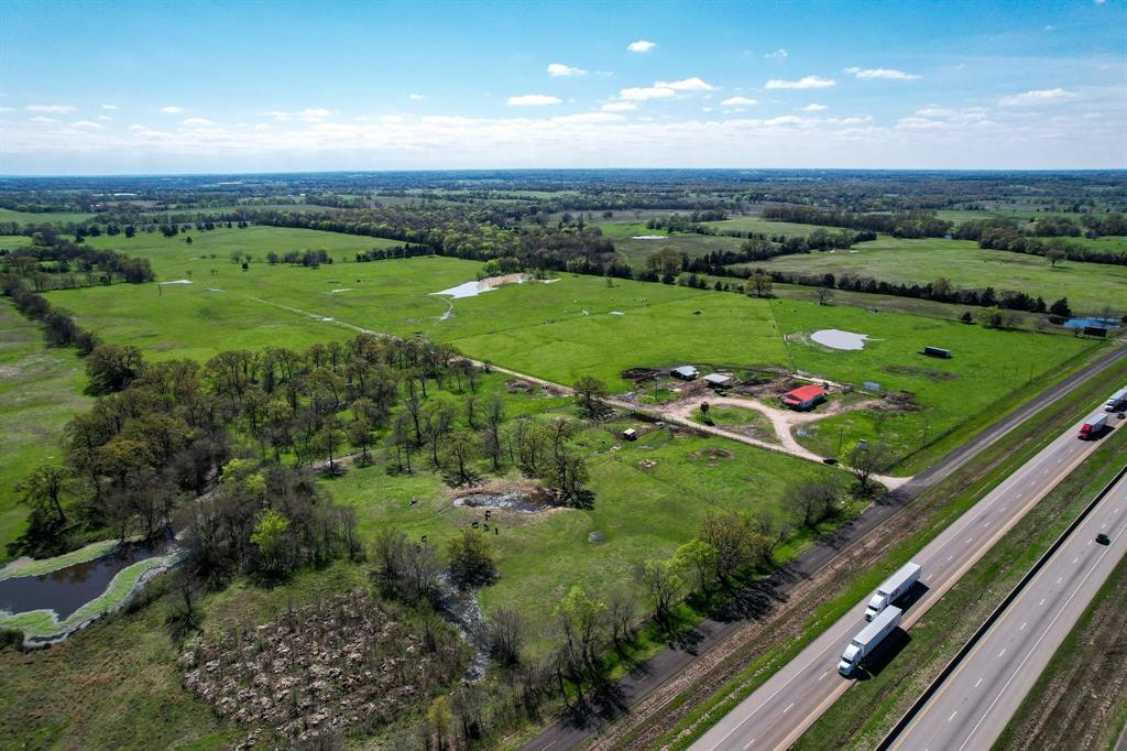 2110 Southwest Access Rd Mount Mount Vernon, TX 75457 - Photo 11 of 14 a view of a city with lush green forest