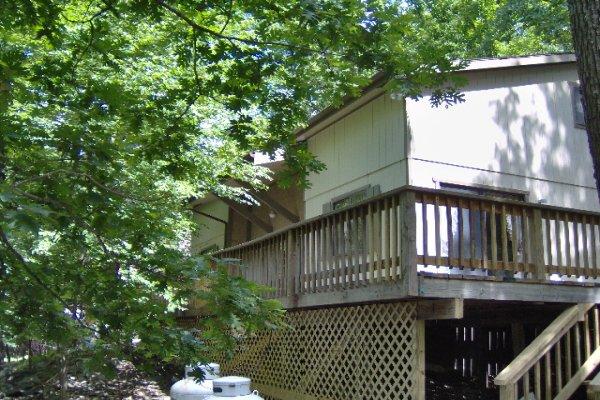 630 Decker Road Bushkill, PA 18324 - Photo 1 of 7 a view of a house with a small yard