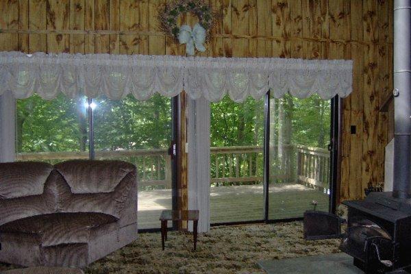 630 Decker Road Bushkill, PA 18324 - Photo 6 of 7 a room with furniture and a garden