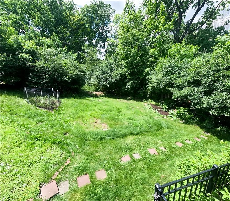 318 Garland Street Pittsburgh, PA 15218 - Photo 6 of 8 a house view with a garden space