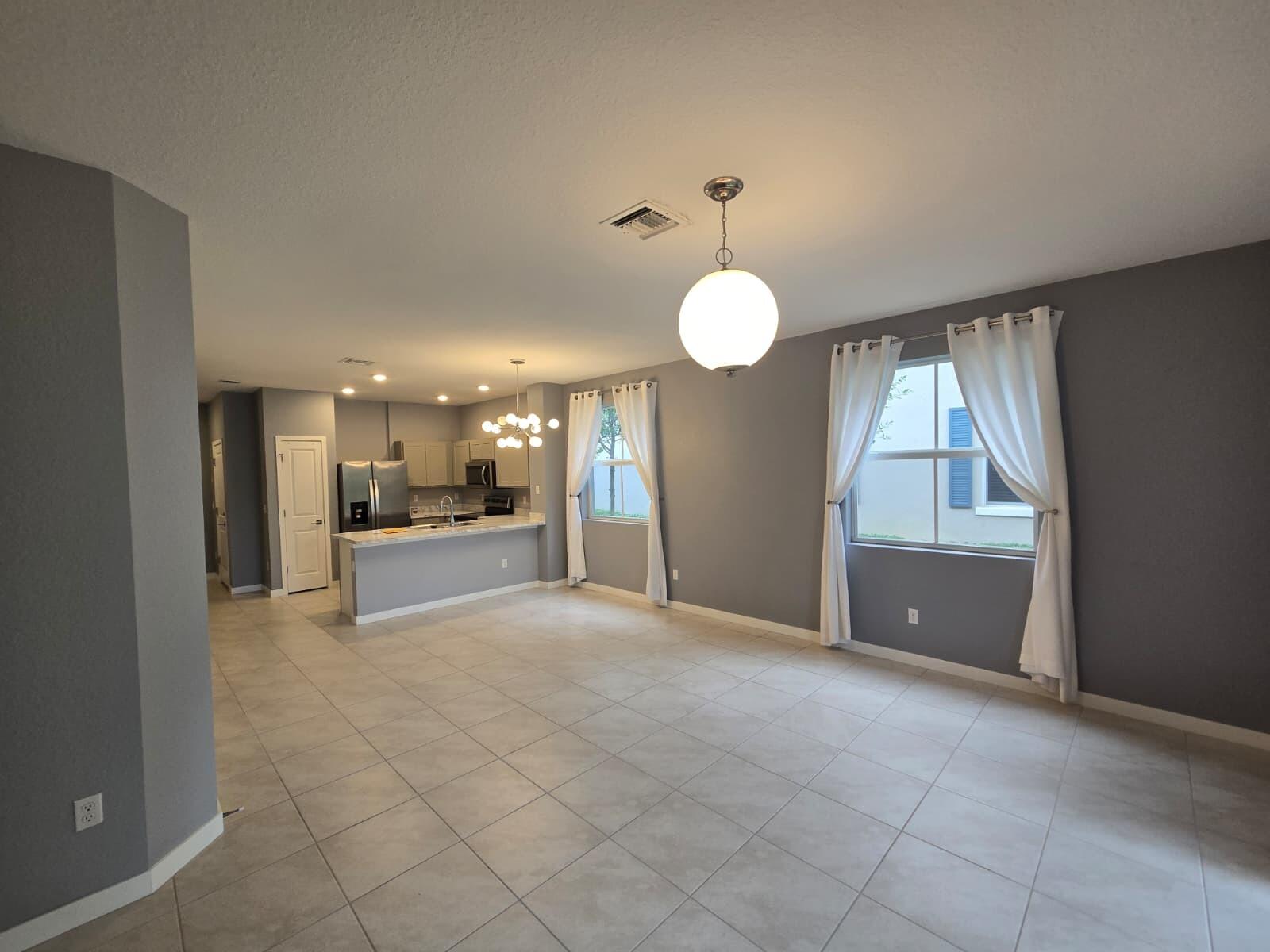 140 Bandol Street Riviera Beach, FL 33404 - Photo 15 of 42 a view of kitchen and windows