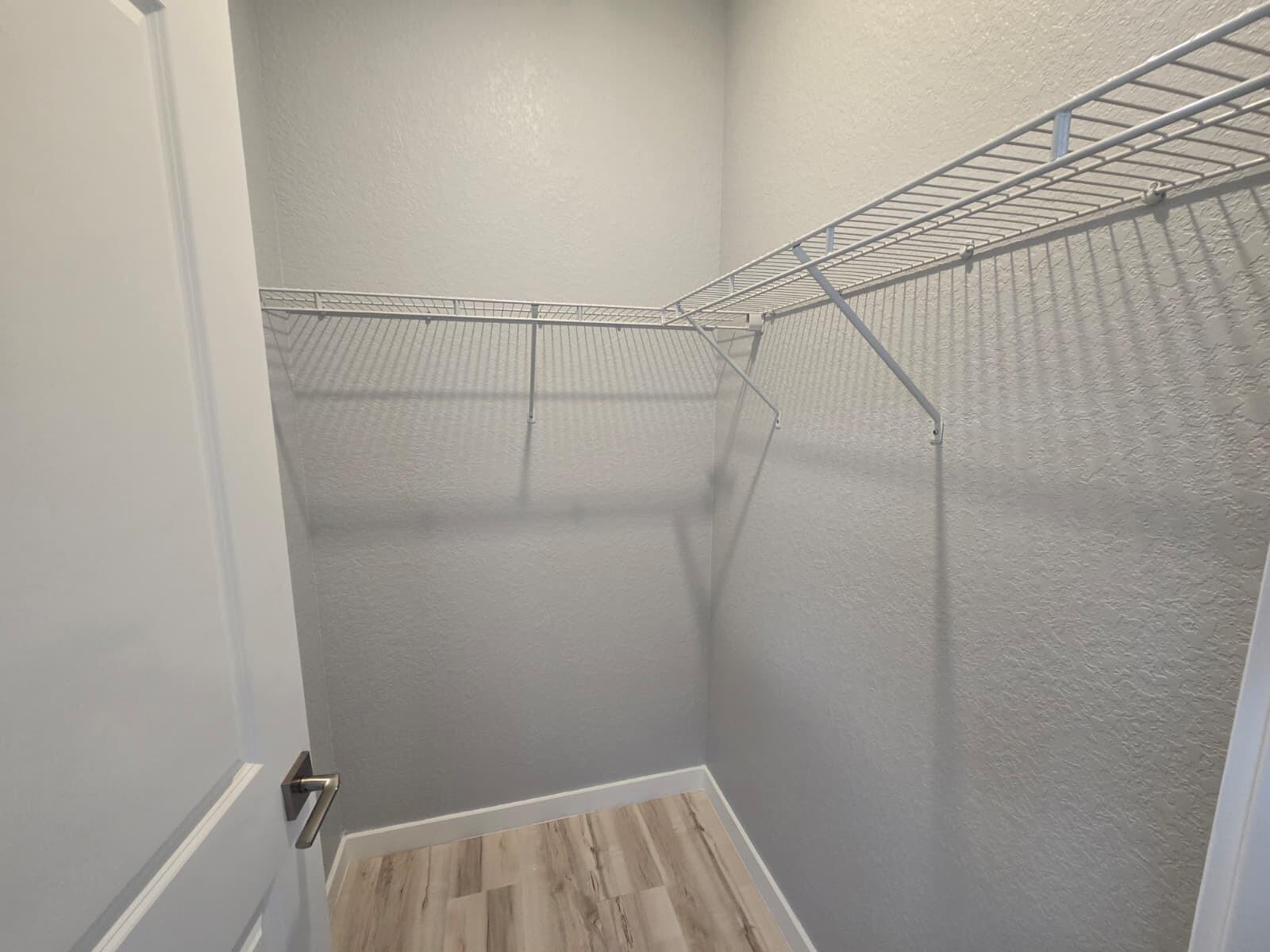 140 Bandol Street Riviera Beach, FL 33404 - Photo 22 of 42 a view of a room with racks on the wall