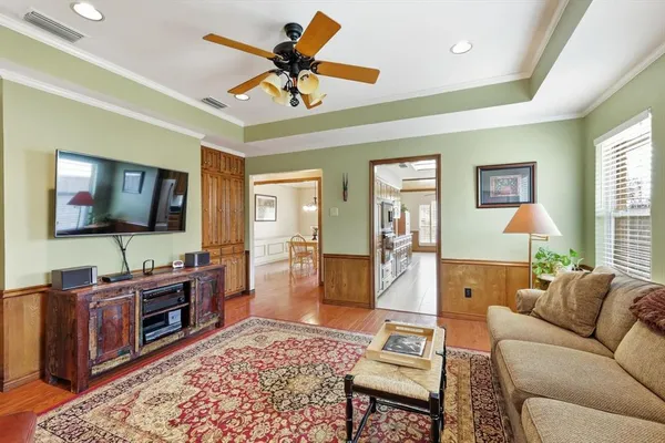 a living room with furniture and a rug