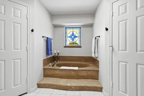 a kitchen with a stove top oven sink and cabinets