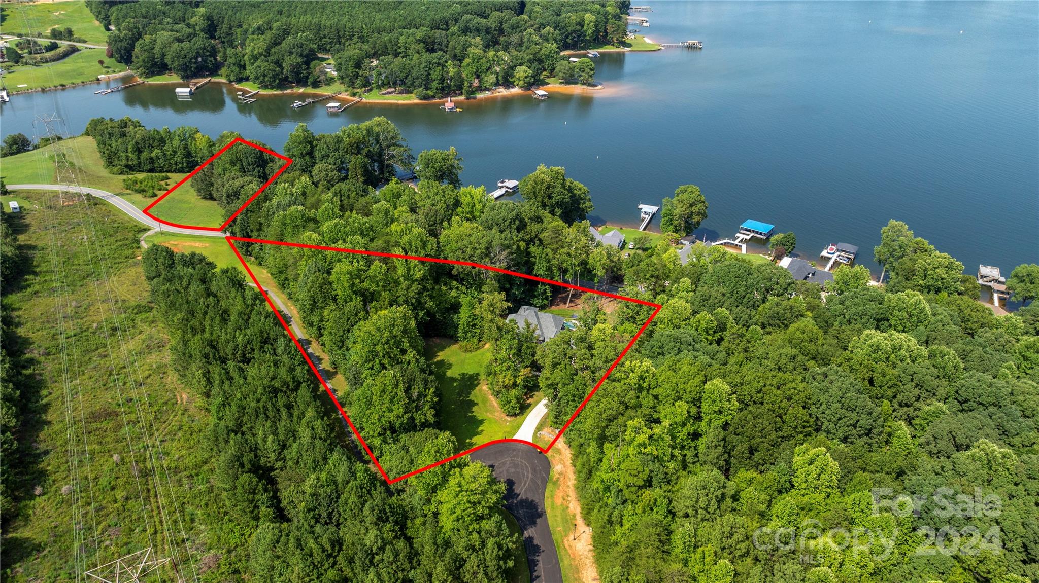 7086 Hawk Shadow Denver, NC 28037 - Photo 3 of 48 an aerial view of a house with a lake view
