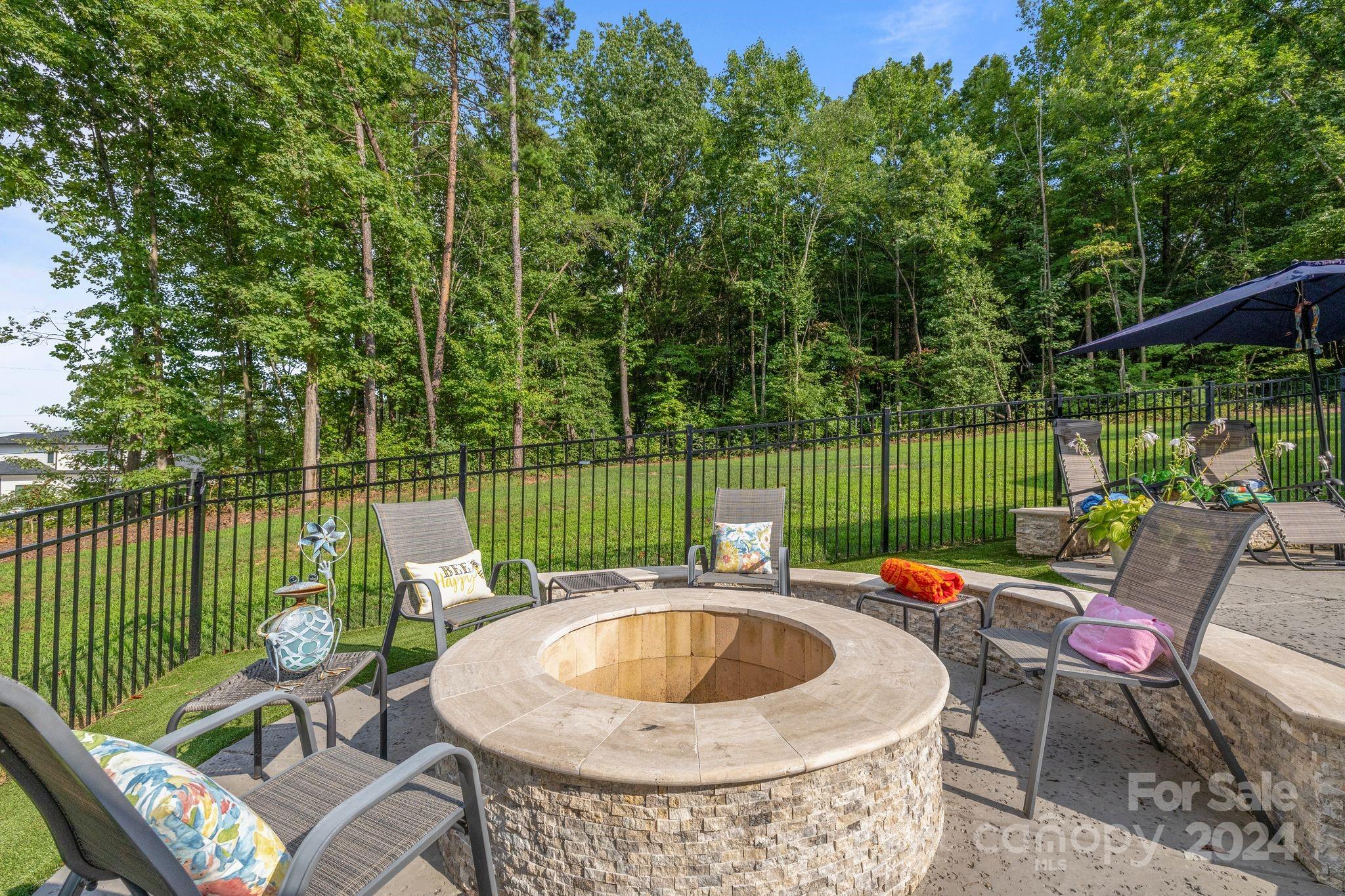 7086 Hawk Shadow Denver, NC 28037 - Photo 46 of 48 an outdoor sitting area with furniture and garden