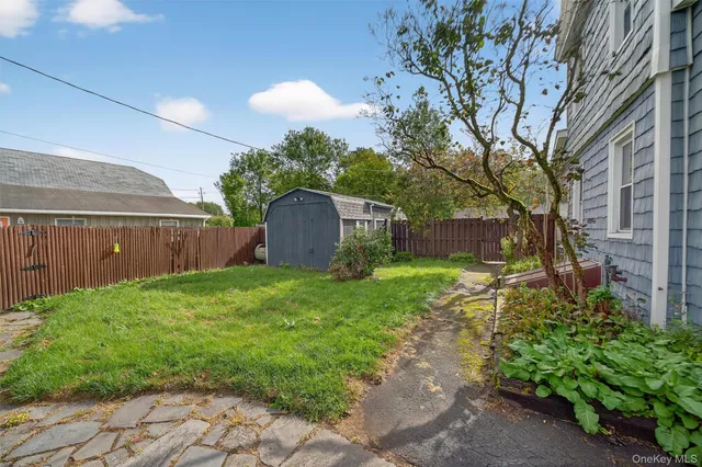 a fire hydrant in the middle of a yard
