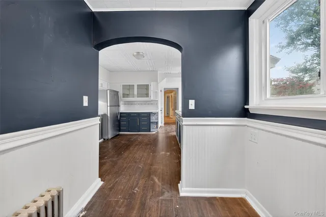 a view of livingroom with hardwood floor and a ceiling fan