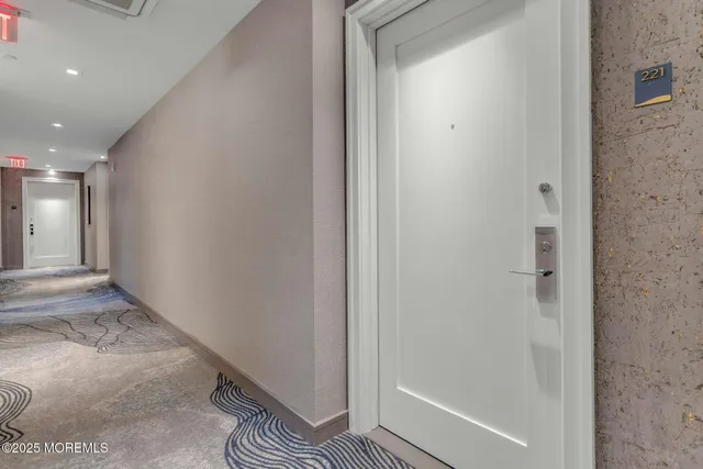 a view of entryway with bathroom