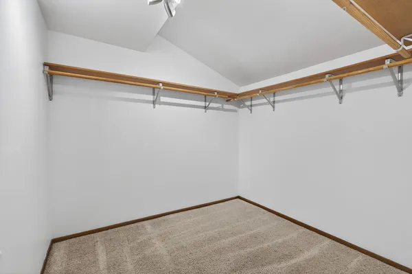 a view of a room with racks on the wall