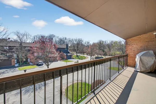 a view of balcony with furniture