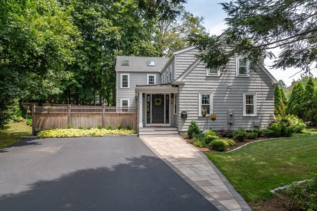 1 Roberts Road Wellesley, MA 02481 - Photo 1 of 29 a house that has a tree in front of the house