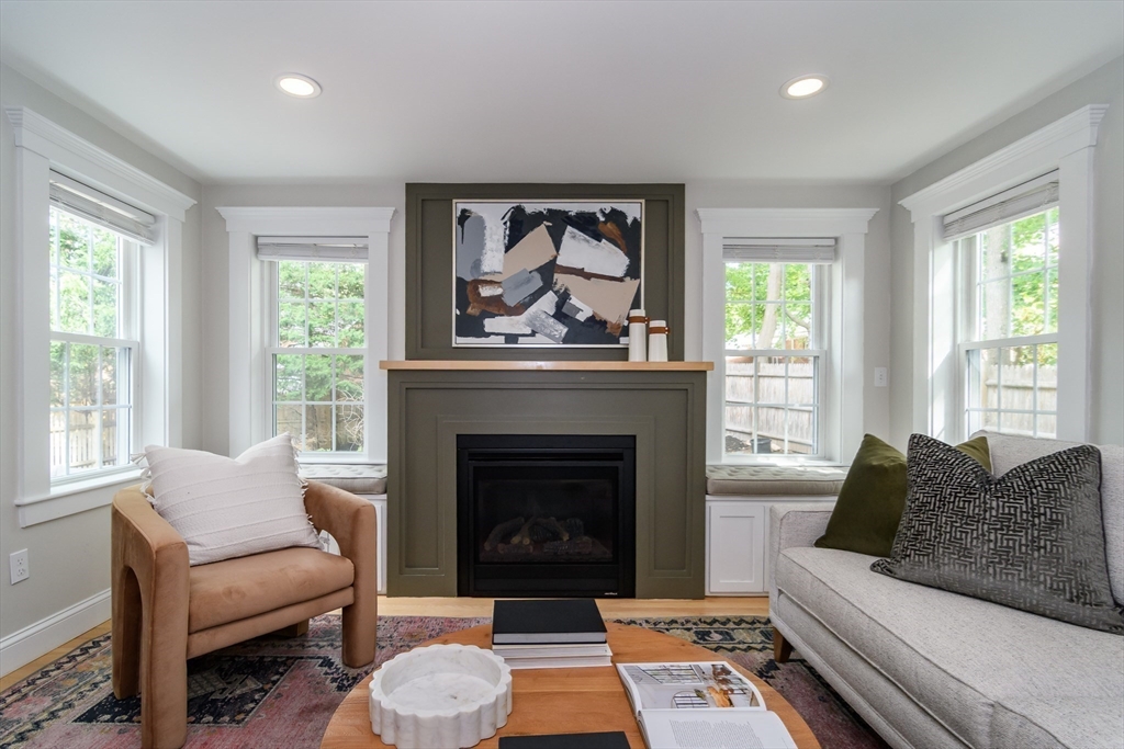 1 Roberts Road Wellesley, MA 02481 - Photo 14 of 29 a living room with furniture and a fireplace