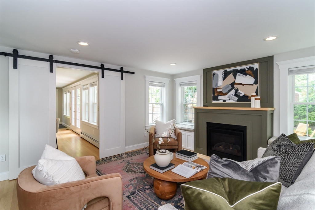 1 Roberts Road Wellesley, MA 02481 - Photo 15 of 29 a living room with furniture and a fireplace