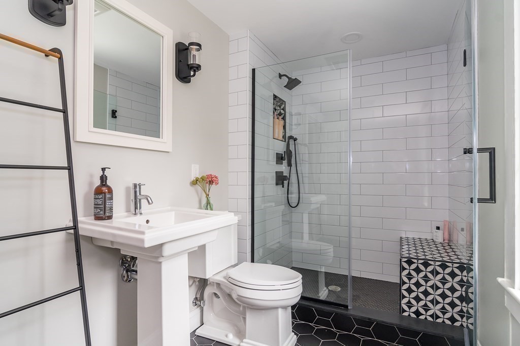 1 Roberts Road Wellesley, MA 02481 - Photo 17 of 29 a bathroom with a sink toilet and shower