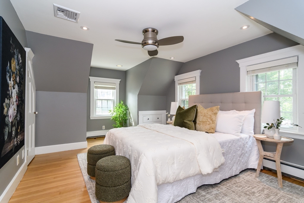 1 Roberts Road Wellesley, MA 02481 - Photo 18 of 29 a spacious bedroom with a bed and ceiling fan