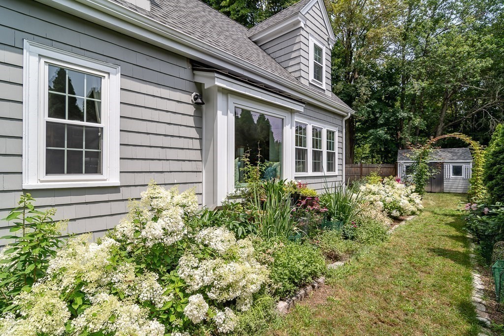 1 Roberts Road Wellesley, MA 02481 - Photo 26 of 29 a house with a plant in front of it