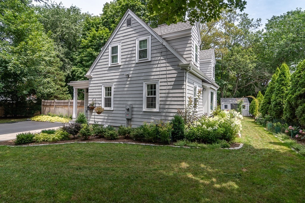 1 Roberts Road Wellesley, MA 02481 - Photo 3 of 29 a view of a house with garden