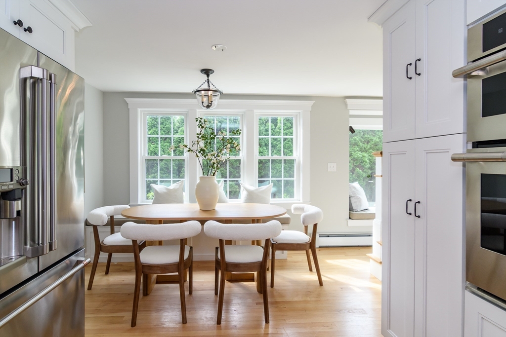1 Roberts Road Wellesley, MA 02481 - Photo 8 of 29 a view of a dining room with furniture window and outside view