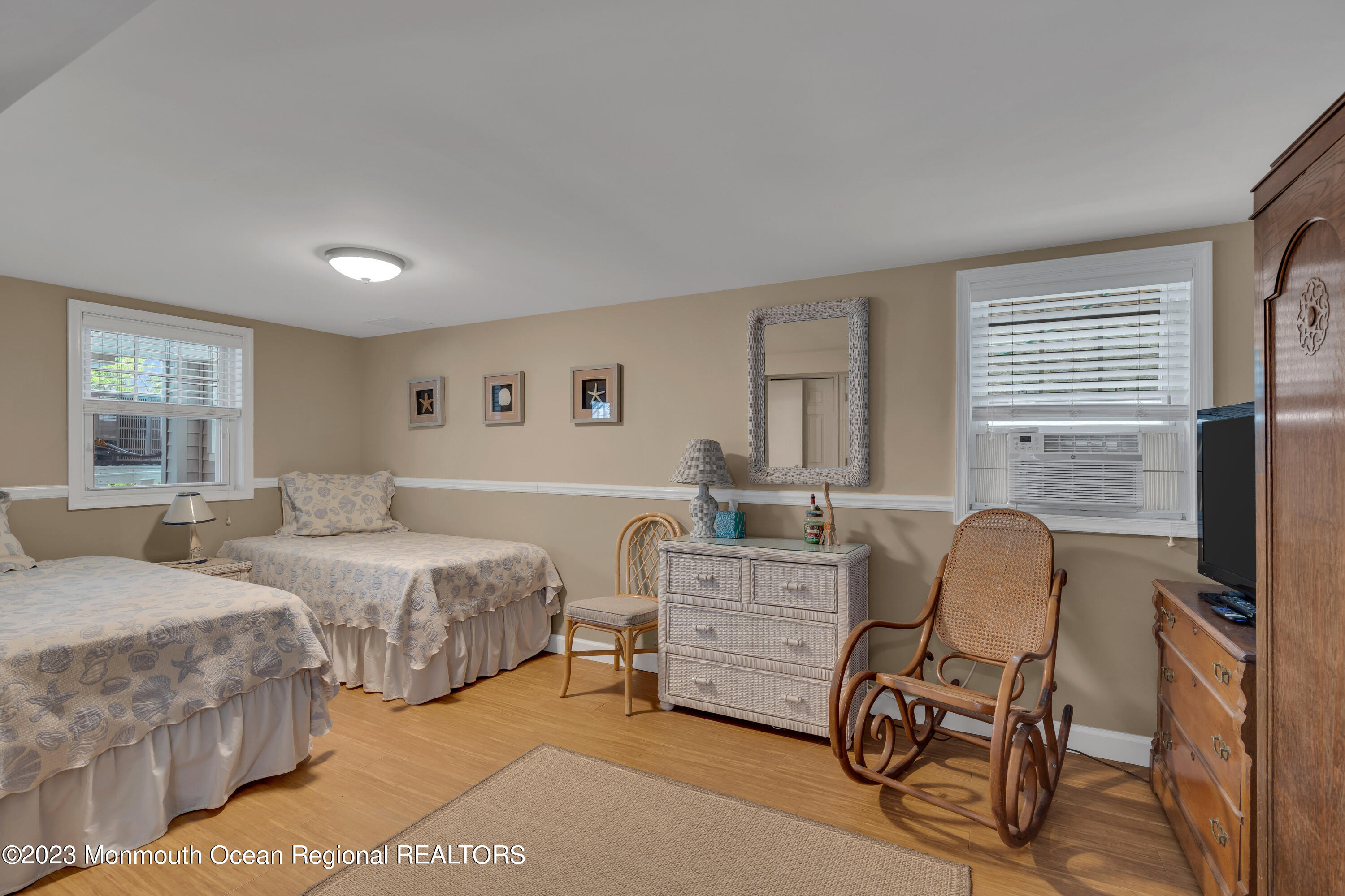 61 Beach Front Manasquan, NJ 08736 - Photo 13 of 20 a living room with furniture and a window