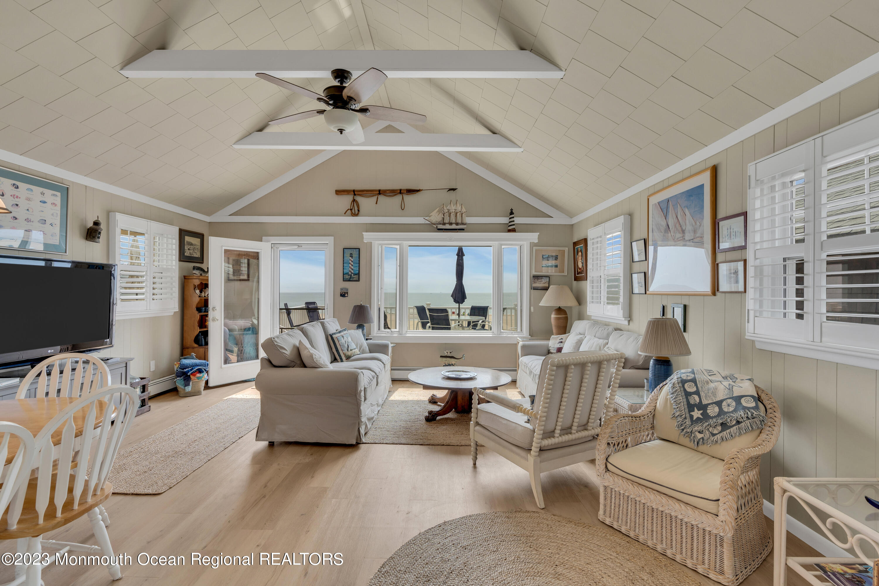 61 Beach Front Manasquan, NJ 08736 - Photo 5 of 20 a living room with furniture and a flat screen tv
