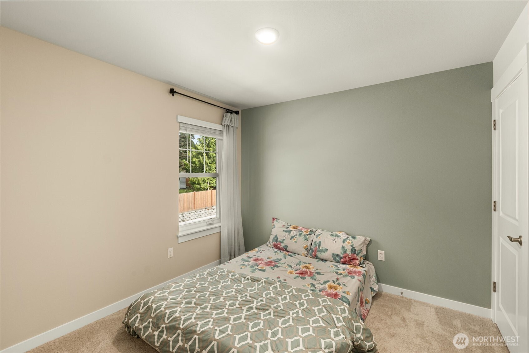 19410 28th Drive Southeast Bothell, WA 98012 - Photo 27 of 37 a bedroom with a bed and a window