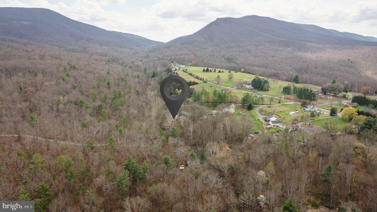 191 Hideaway Farms Road Edinburg, VA 22824 - Photo 40 of 40 a view of a lush green field