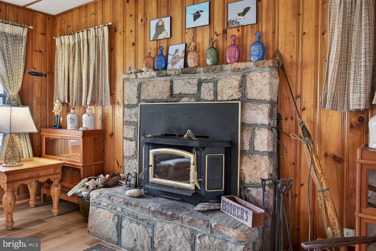 191 Hideaway Farms Road Edinburg, VA 22824 - Photo 9 of 40 a living room with furniture and a fireplace