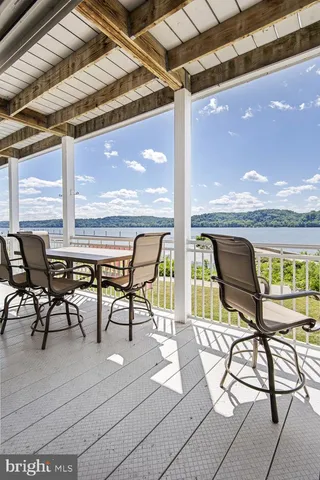a view of living room with furniture and floor to ceiling window