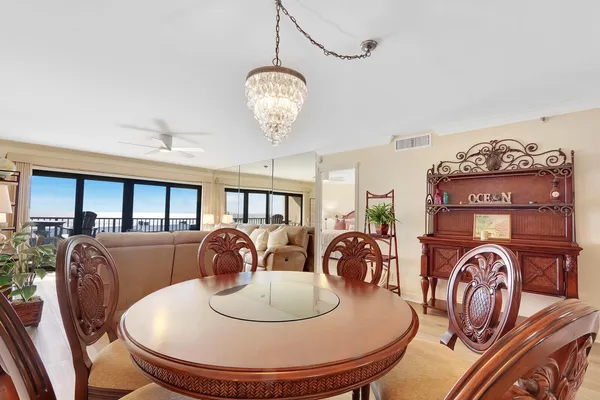 a view of a dining room with furniture