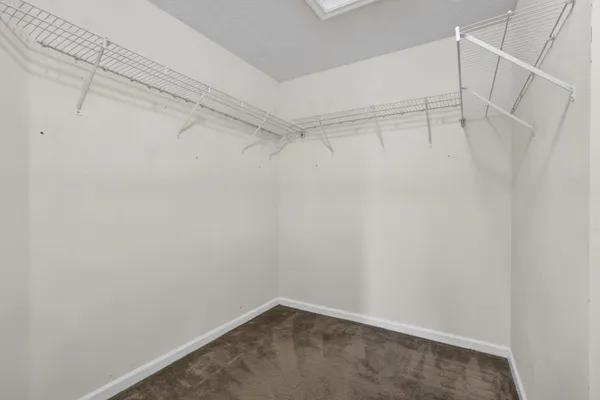 a view of a room with racks on the wall