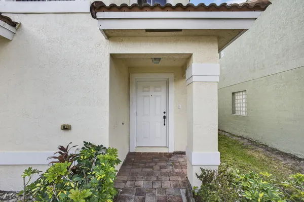 a view of a entryway door of the house