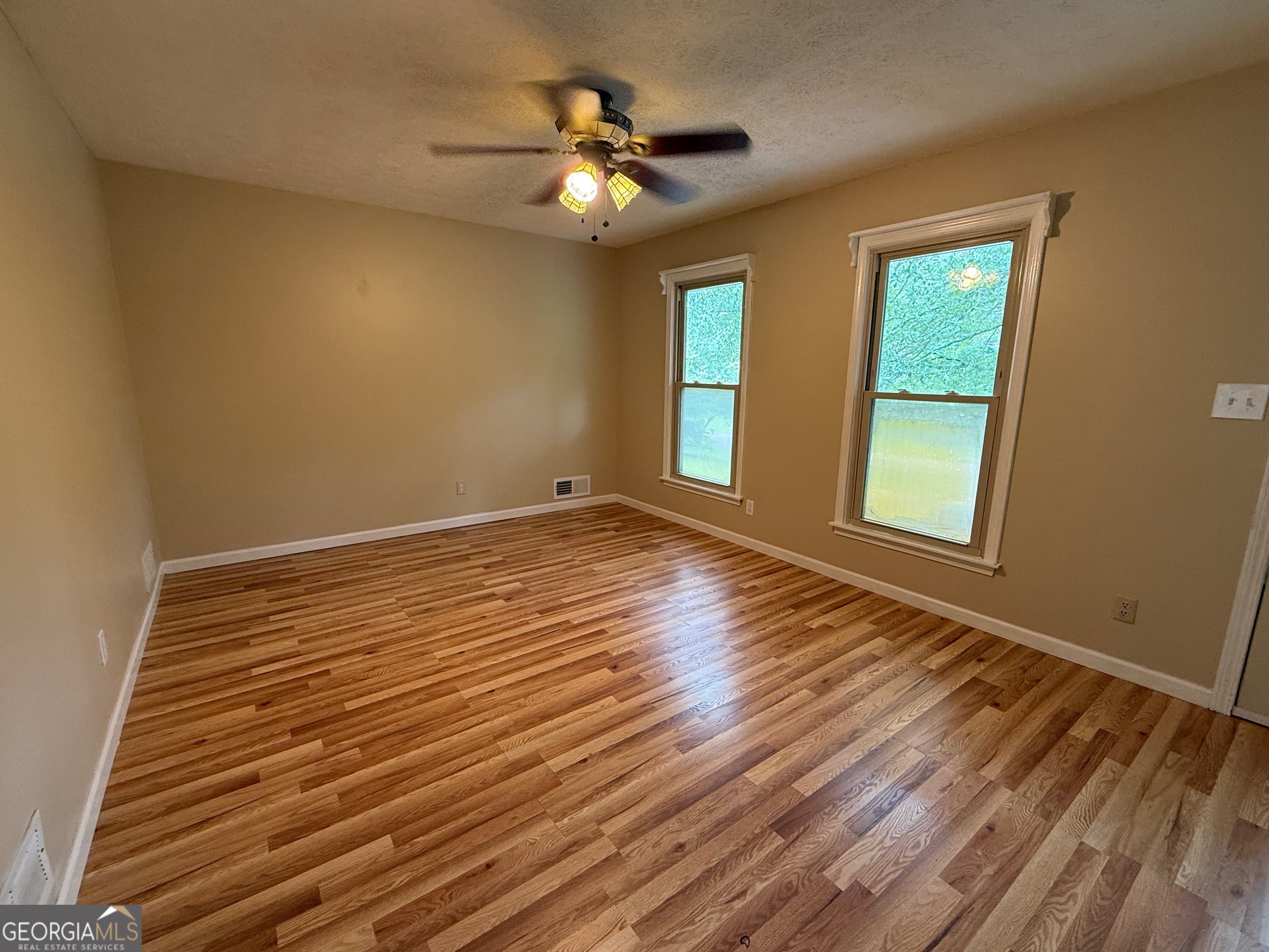 2691 Falcon Ridge Drive Southwest Grayson, GA 30017 - Photo 3 of 10 a view of an empty room with a window