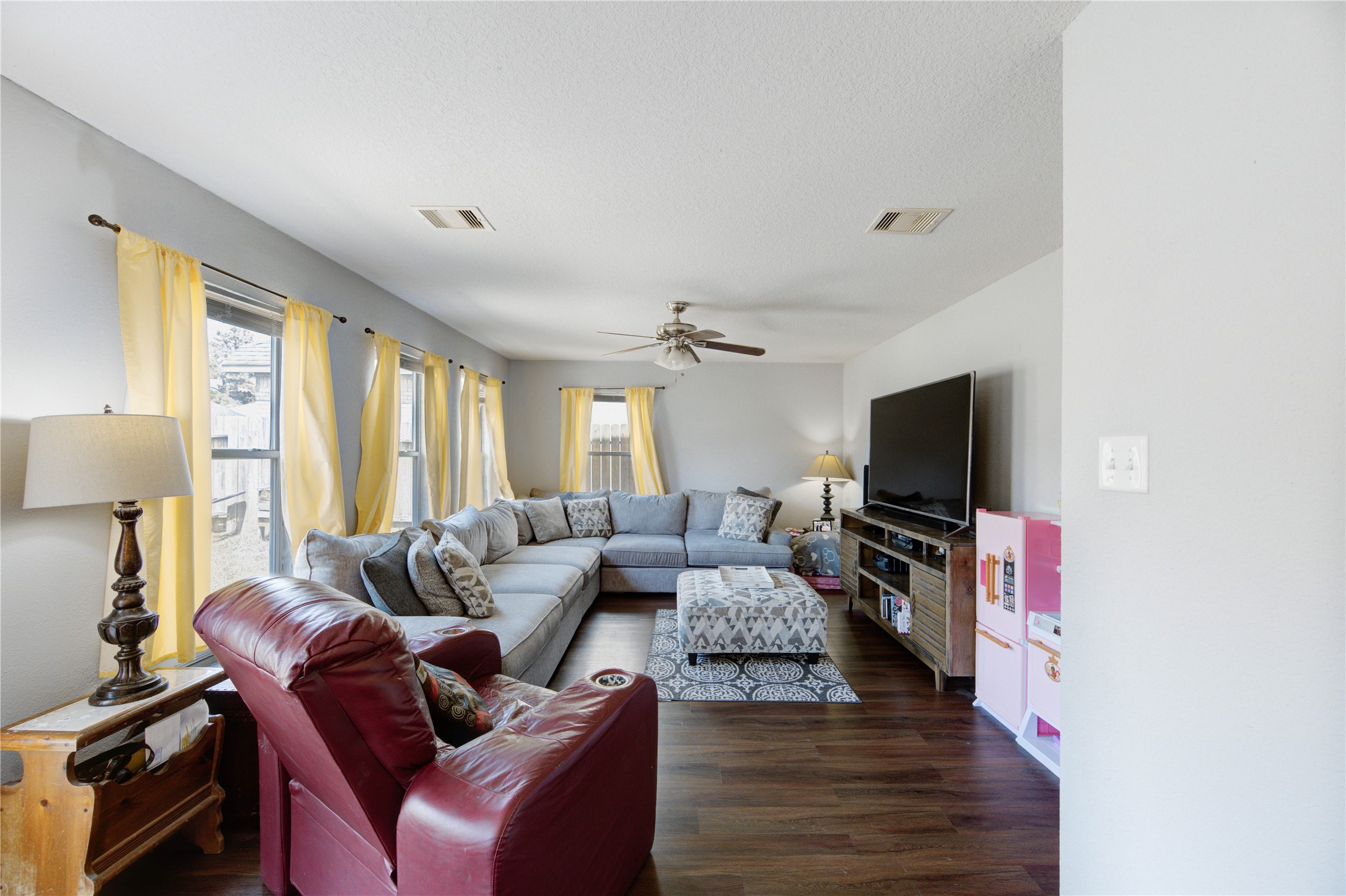 19103 Crystola Park Spring, TX 77373 - Photo 22 of 49 a living room with furniture and a flat screen tv