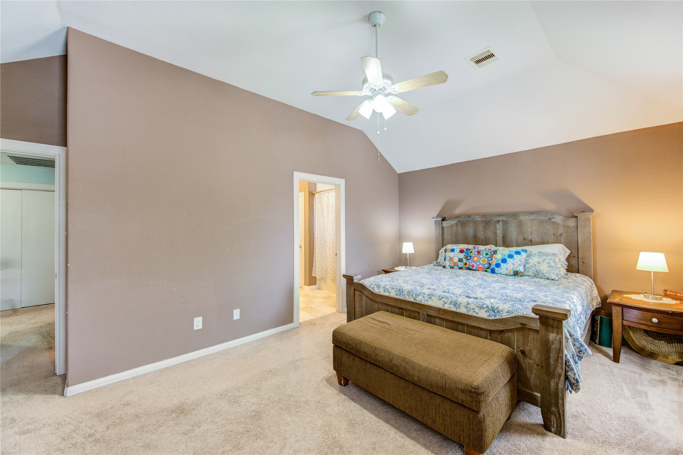 19103 Crystola Park Spring, TX 77373 - Photo 26 of 49 a bedroom with a bed and a chandelier
