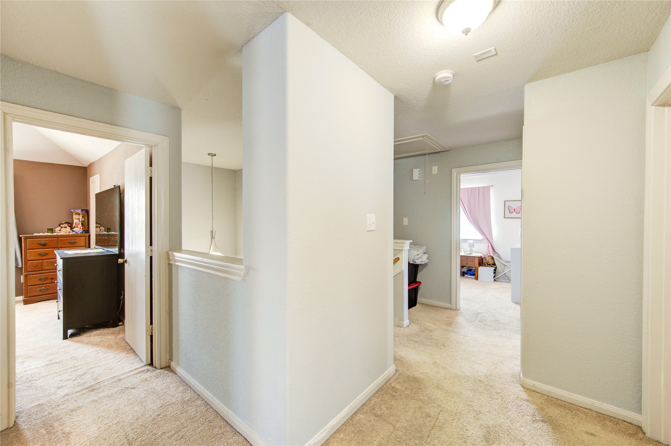 19103 Crystola Park Spring, TX 77373 - Photo 30 of 49 a view of a hallway with furniture and a livingroom