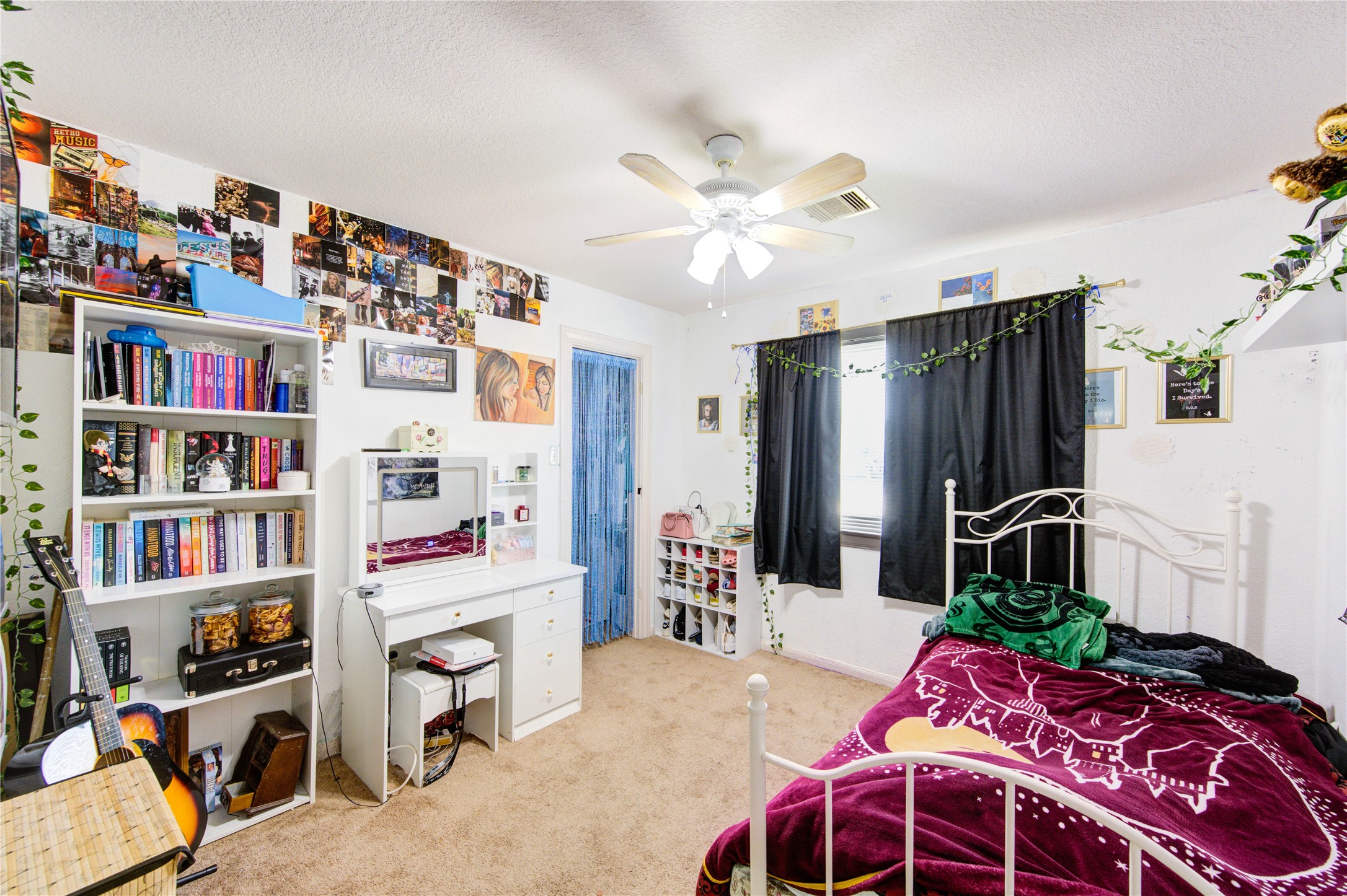 19103 Crystola Park Spring, TX 77373 - Photo 31 of 49 a bedroom with a bed furniture and a book shelf