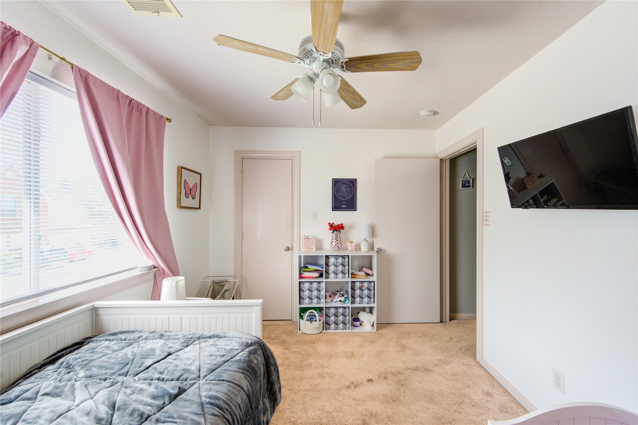 19103 Crystola Park Spring, TX 77373 - Photo 37 of 49 a bedroom with a bed and a flat screen tv