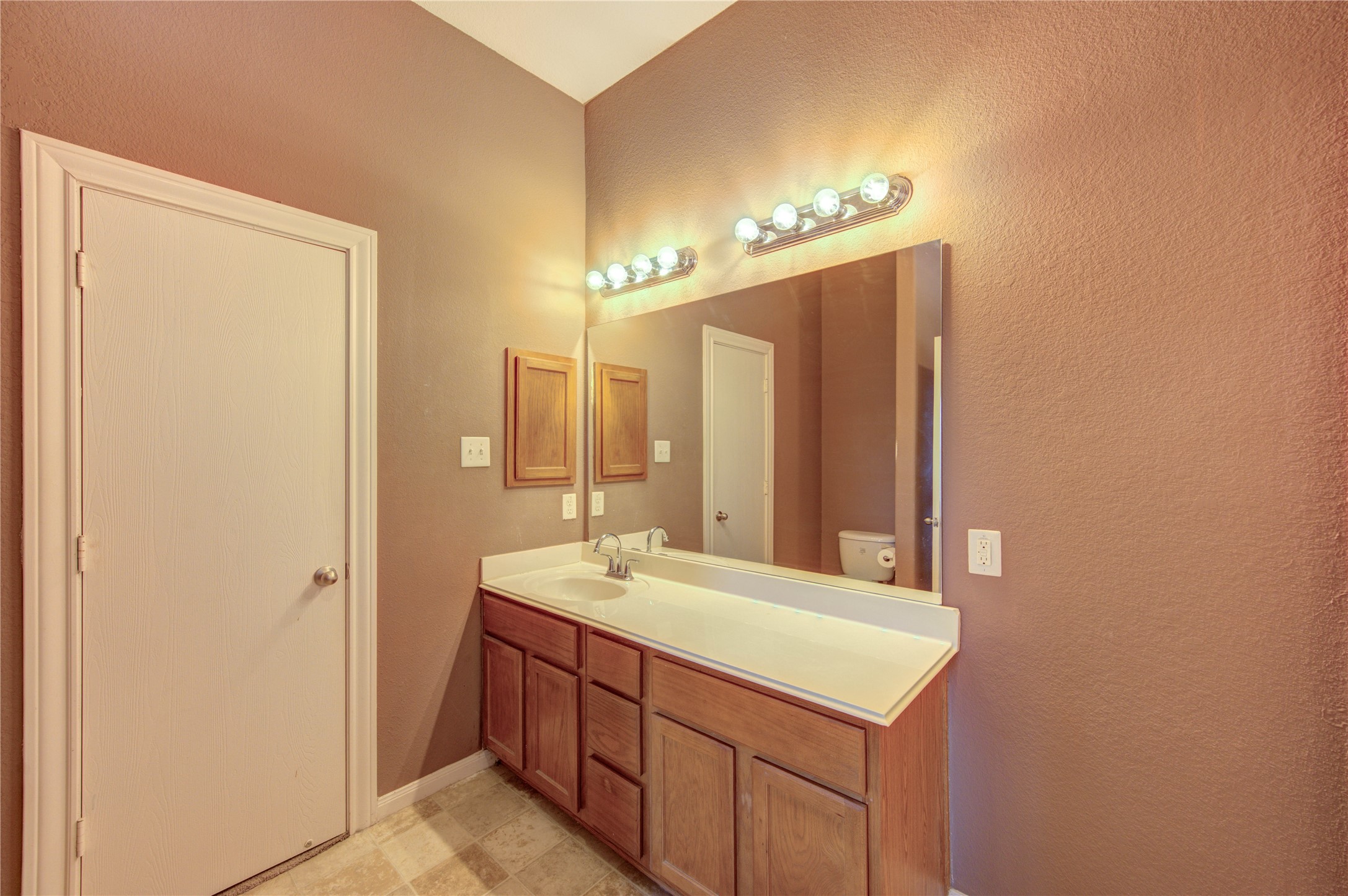 19103 Crystola Park Spring, TX 77373 - Photo 44 of 49 a bathroom with a sink and a mirror