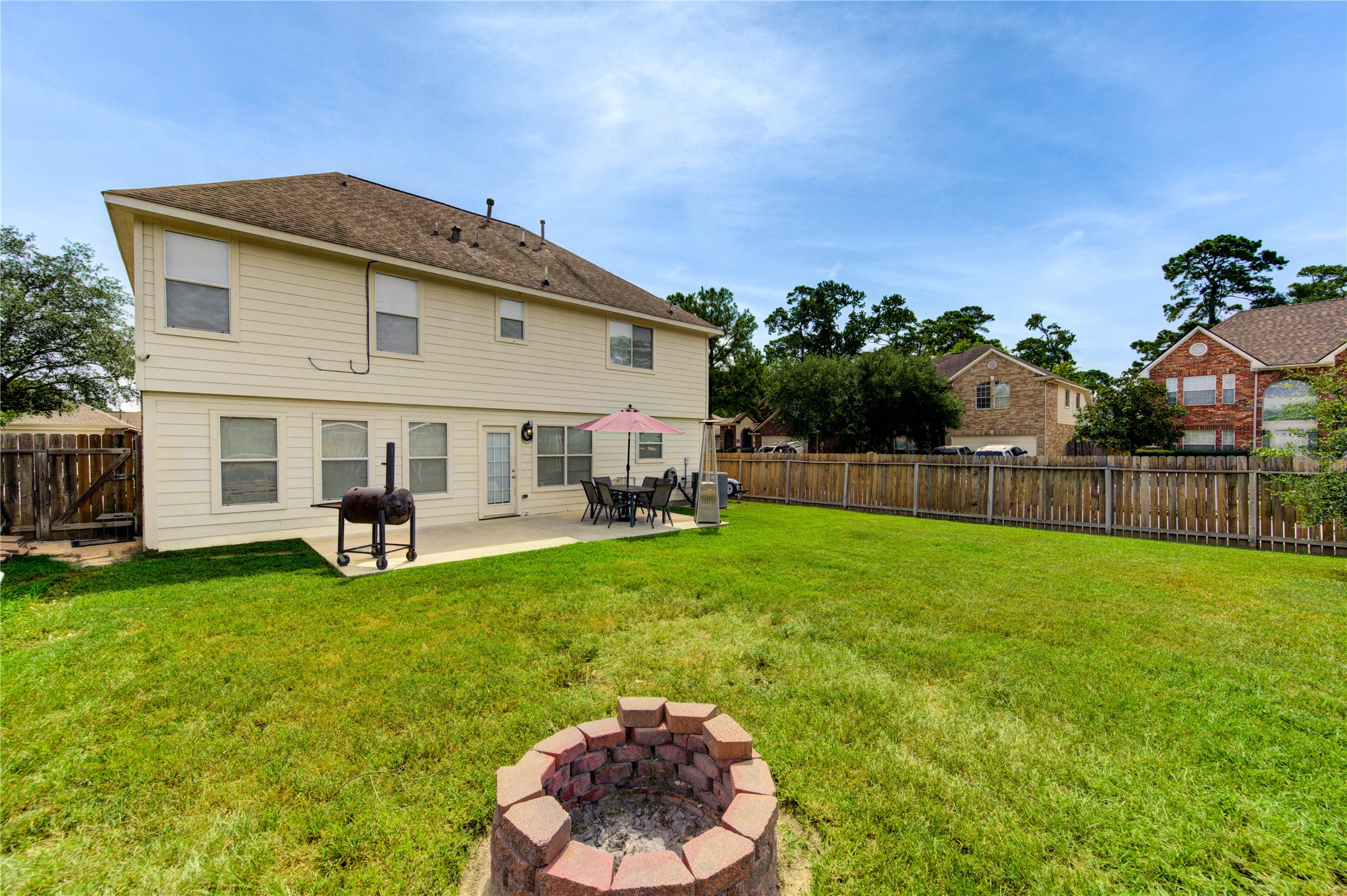 19103 Crystola Park Spring, TX 77373 - Photo 47 of 49 a view of a house with backyard and sitting area