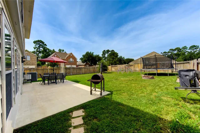 swimming pool with table and chairs