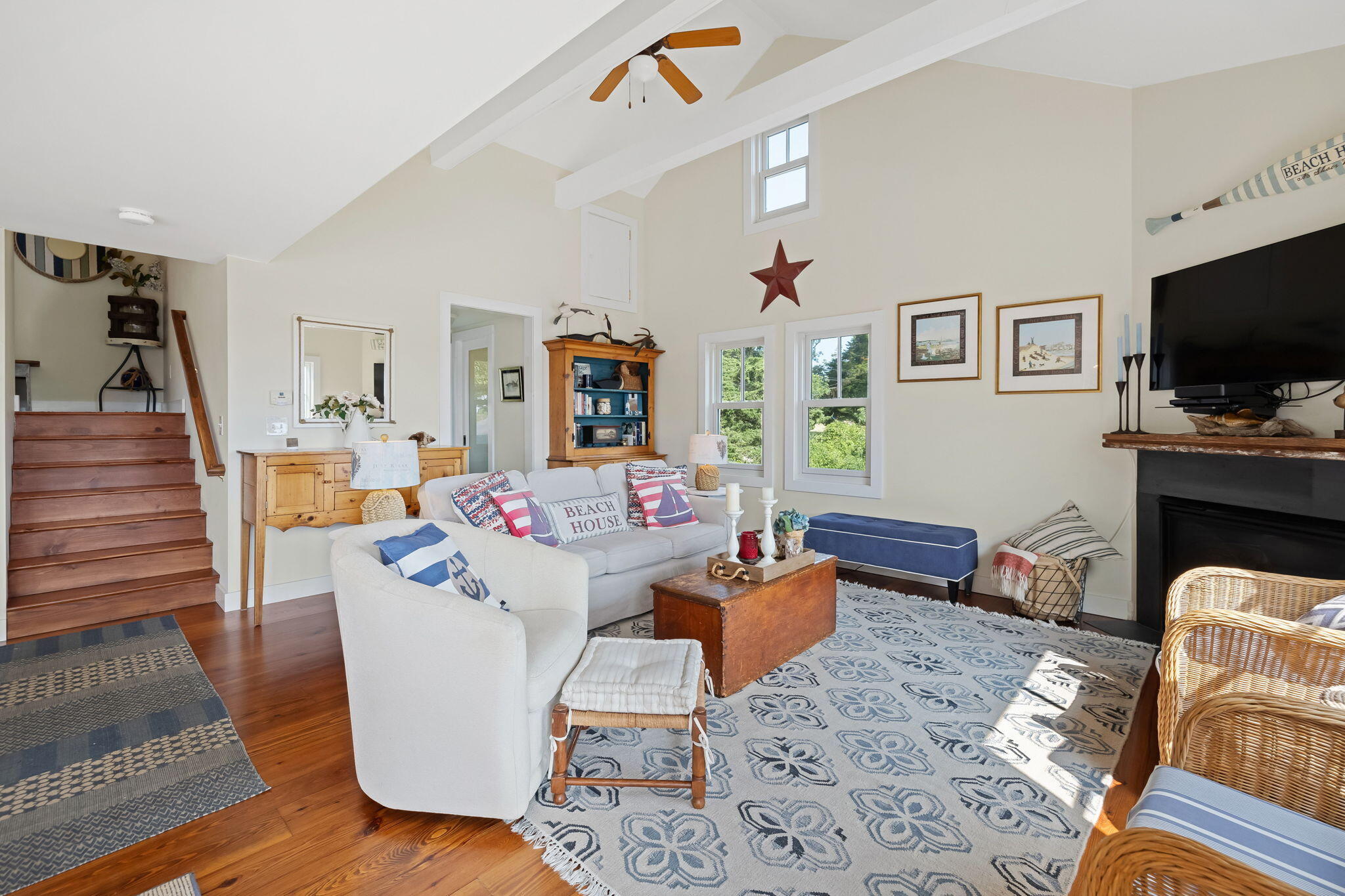 63 Briar Spring Road Orleans, MA 02653 - Photo 9 of 37 a living room with furniture and a flat screen tv