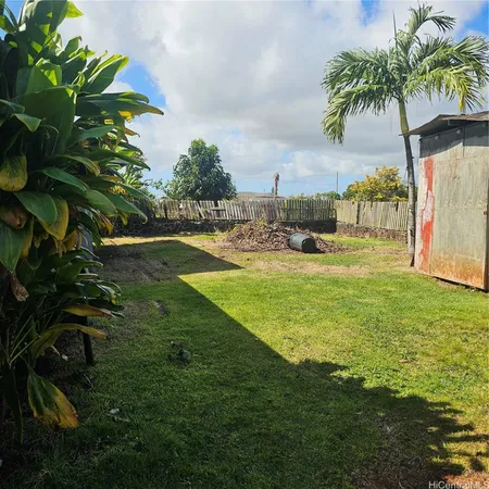 a view of a yard with a fountain