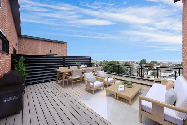 a view of a terrace with seating area