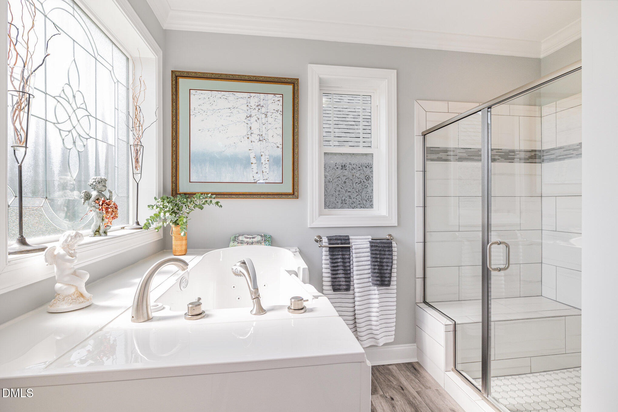 17 Kiowa Court Willow Spring, NC 27592 - Photo 12 of 27 a bathroom with a sink and a tub